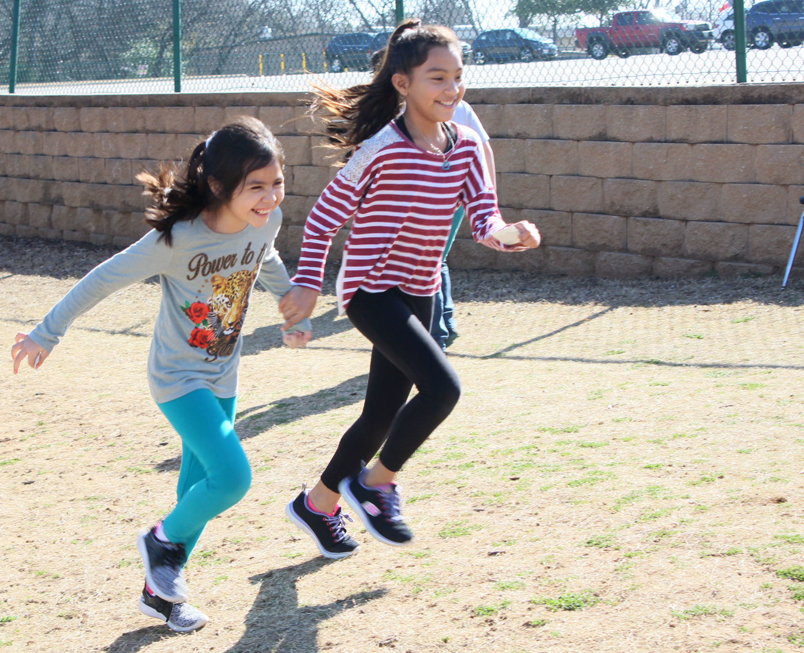Third-graders running